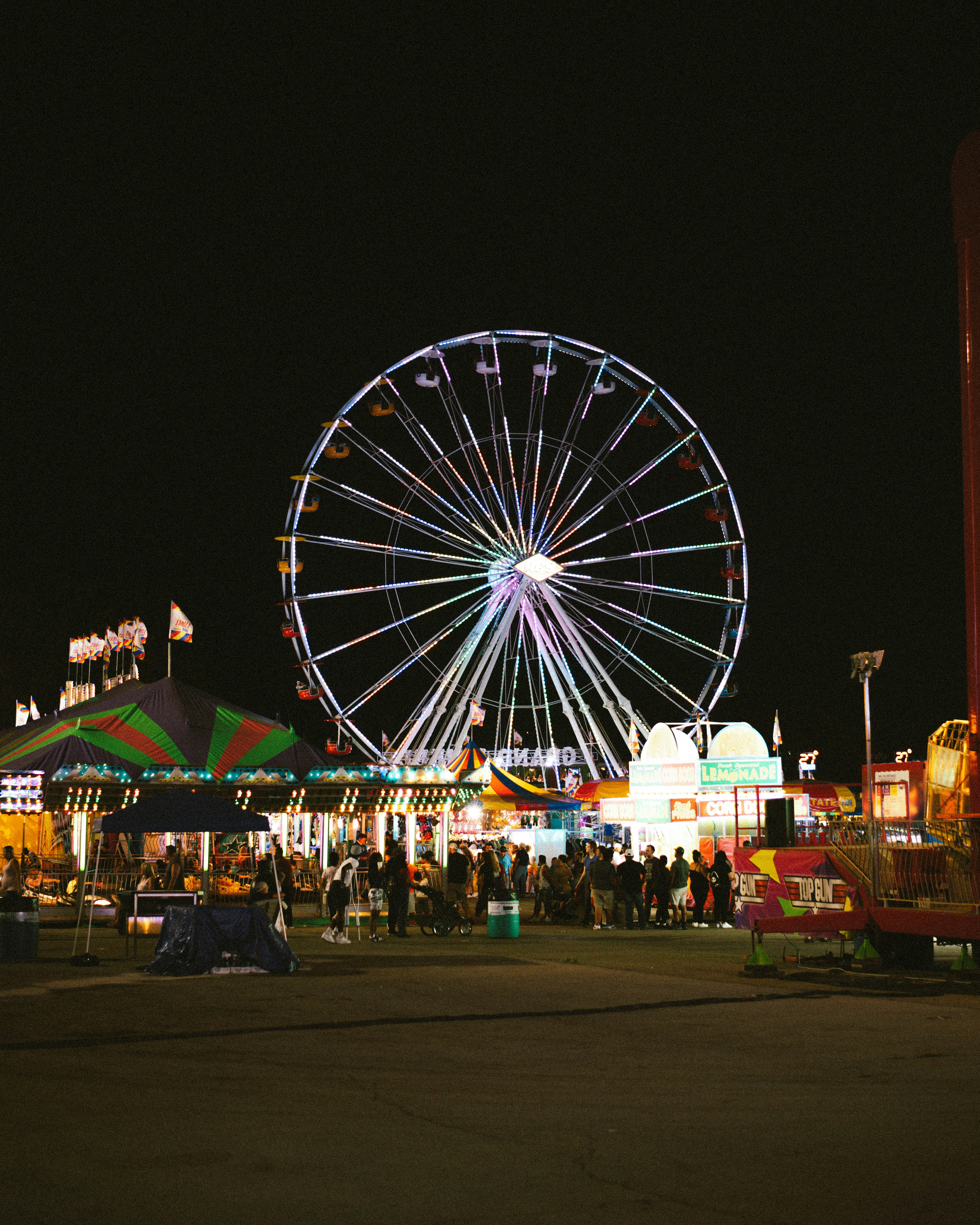 people walking on park during night time